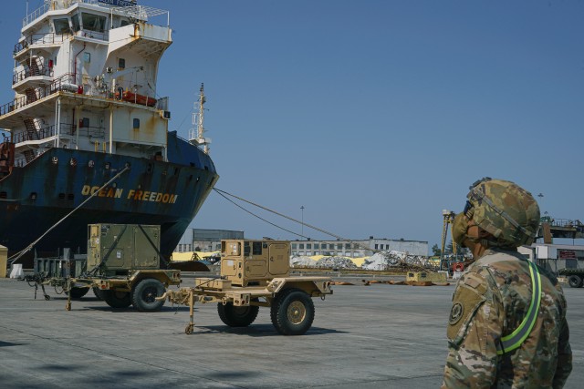 A U.S. Soldier, assigned to the 4th Squadron, 2d Cavalry Regiment, looks up at vessel during port operations for the Noble Partner 20 exercise in Poti, Georgia, Sept. 4, 2020. Exercise Noble Partner is designed to enhance regional partnerships and...