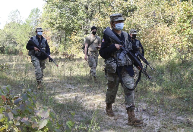 Cadets from Marquette University's Golden Eagle Battalion ROTC program serve as the opposition forces for other cadets conducting tractical training at Fort McCoy, Wis., Sept. 25, 2020. Training such as this helps to prepare the cadets to meet...