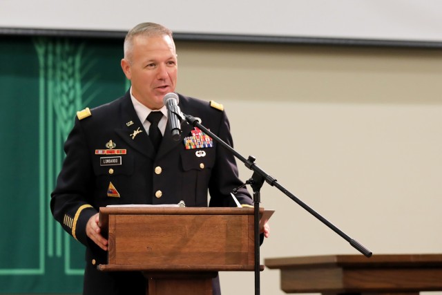 Combined Arms Center-Training Deputy Commander Col. Charles Lombardo speaks during the retirement ceremony he hosted for CAC-T Sgt. Maj. James Scullion Sept. 25 at the Frontier Chapel, Fort Leavenworth, Kan. Scullion joined the Army in 1988 and has served as the CAC-T senior enlisted advisor since 2018. Photo by Tisha Swart-Entwistle, Combined Arms Center-Training Public Affairs.