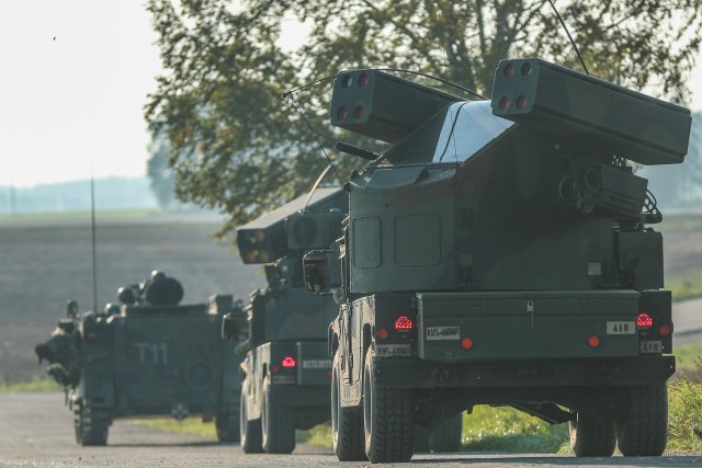 Soldiers from Alpha Battery, 5th Battalion, 4th Air Defense Artillery Regiment integrate with the Lithuanian King Mindaugas Hussars Battalion during tactical convoy and breach of an airbase.