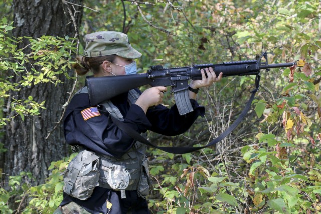 Cadet Rachael Samalis, an MS4 from University of Wisconsin-Milwaukee, provides suppressive fire as a member of the opposition forces during tactical training at Fort McCoy, Wis., Sept. 25, 2020. This training prepares these future officers for...
