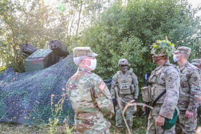 Brig. Gen. Gregory Brady and Command Sgt. Maj. Gioncarlo Marci conduct a site visit of 5th Battalion, 4th Air Defense Artillery Regiment's battle position during Tobruq Legacy 20.