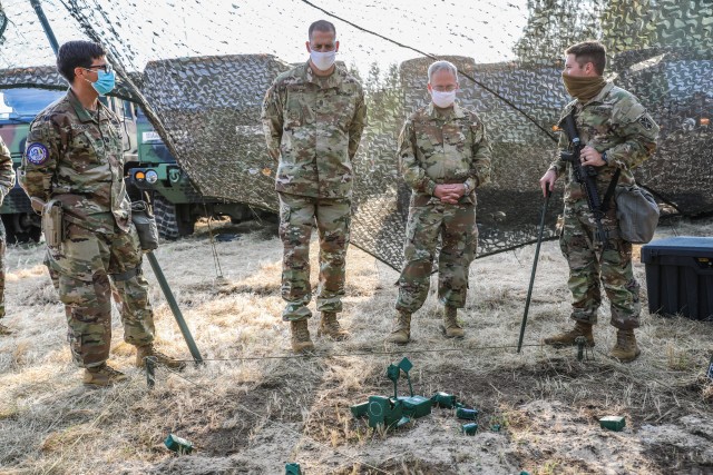 Brig. Gen. Gregory Brady and Command Sgt. Maj. Gioncarlo Marci conduct a site visit of 5th Battalion, 7th Air Defense Artillery's site during Tobruq Legacy 20.
