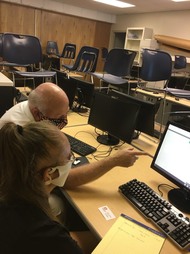 Local government liaison Steve Sweeney trains a volunteer assisting Vernon Parish residents in Evans, La., Sept. 10, 2020, on how to apply online for a temporary blue roof through Operation Blue Roof. Our LGLs deploy during disaster response to...