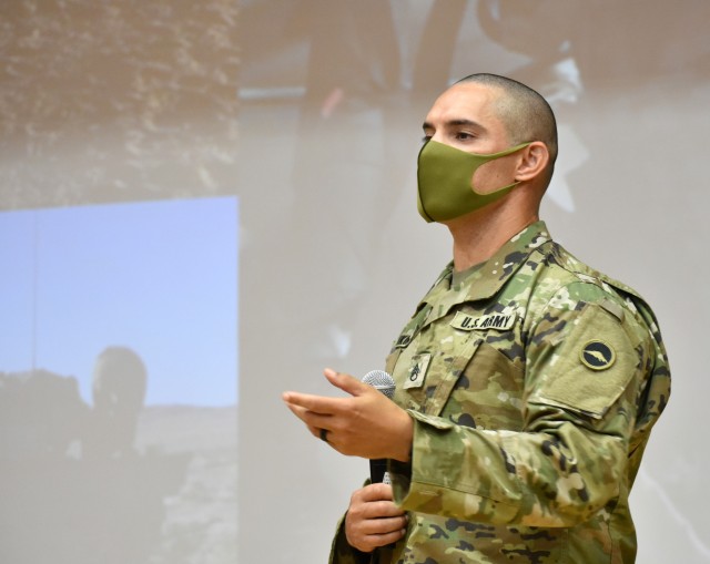 Staff Sgt. James Hankins, individual mobilization augmentee manager for U.S. Army Reserve Affairs Japan, U.S. Army Japan, talks to Japan Ground Self-Defense Force Technical Reserve Candidates about his experiences as an interpreter during the...