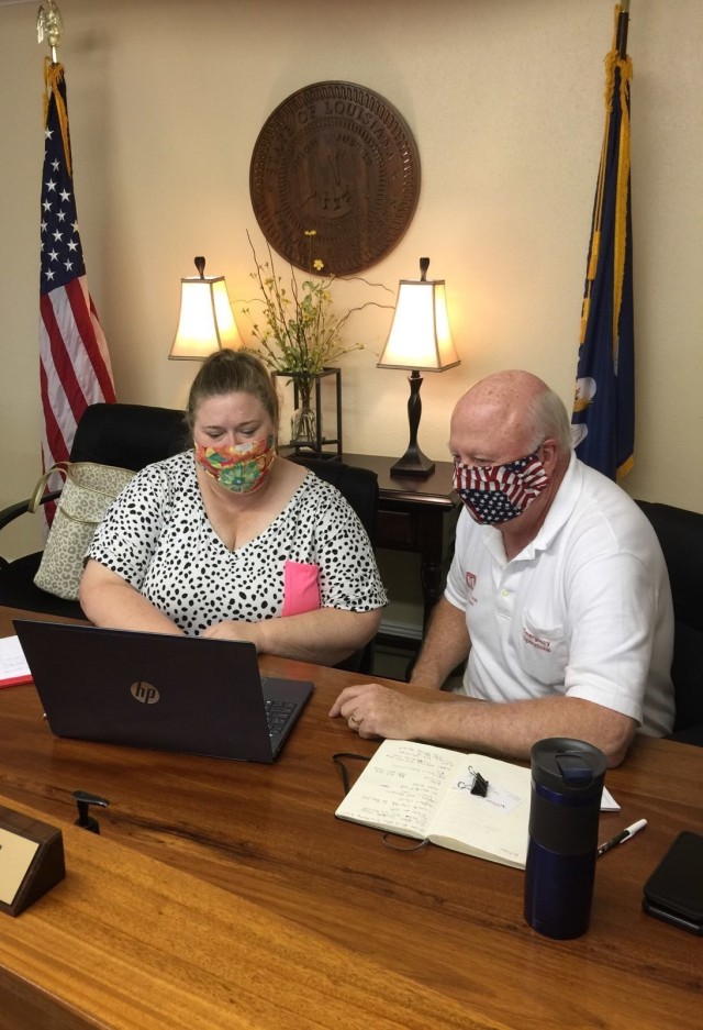 Local government liaison Steve Sweeney trains a volunteer assisting Vernon Parish residents in Simpson, La., Sept. 10, 2020, on how to apply online for a temporary blue roof through Operation Blue Roof. Our LGLs deploy during disaster response to...