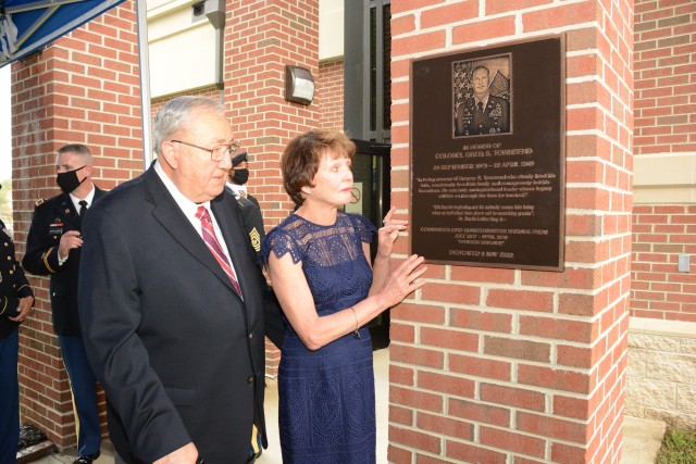 FORT LEE, VA. -- Dr. Charles and Dianne Townsend-Kroncke admire the plaque and building now honoring her son Col. Gregory Townsend Sept. 25 at what was formerly the 23rd Quartermaster Brigade headquarters.