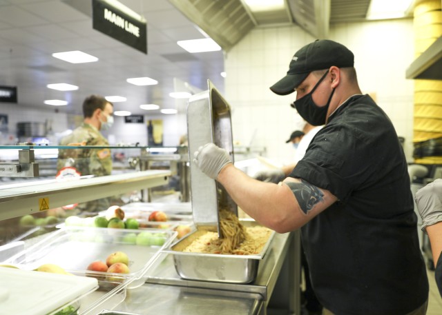 U.S. Army Cpl. Stephen Carver, a nutrition care specialist at Landstuhl Regional Medical Center, prepares sustenance for serving during the lunch hour at LRMC, Sept. 18. The LRMC Nutrition Care Division has expanded service capabilities in light of increased demand during the COVID-19 pandemic.