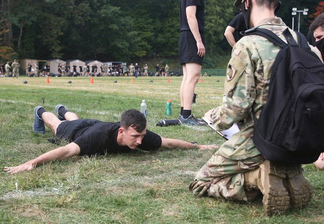 A cadet performs the T-push-up during the hand-release pushup portion of the six-event Army Combat Fitness Test.