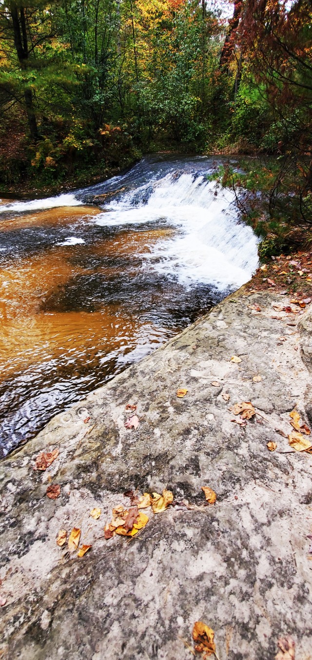 A scene of Trout Falls on the La Crosse River in the Pine View Recreation Area is shown with fall colors Sept. 27, 2020, at Fort McCoy, Wis. The recreation area includes acres of publicly accessible land with hiking trails, Pine View Campground,...