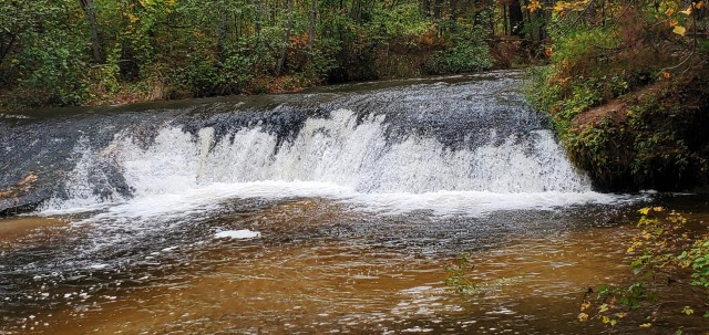 A scene of Trout Falls on the La Crosse River in the Pine View Recreation Area is shown with fall colors Sept. 27, 2020, at Fort McCoy, Wis. The recreation area includes acres of publicly accessible land with hiking trails, Pine View Campground,...