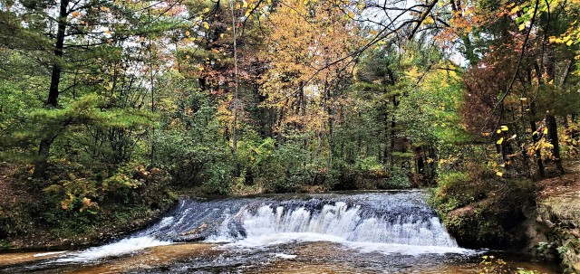 A scene of Trout Falls on the La Crosse River in the Pine View Recreation Area is shown with fall colors Sept. 27, 2020, at Fort McCoy, Wis. The recreation area includes acres of publicly accessible land with hiking trails, Pine View Campground,...