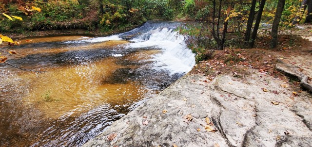 A scene of Trout Falls on the La Crosse River in the Pine View Recreation Area is shown with fall colors Sept. 27, 2020, at Fort McCoy, Wis. The recreation area includes acres of publicly accessible land with hiking trails, Pine View Campground,...