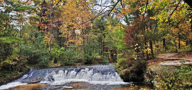 A scene of Trout Falls on the La Crosse River in the Pine View Recreation Area is shown with fall colors Sept. 27, 2020, at Fort McCoy, Wis. The recreation area includes acres of publicly accessible land with hiking trails, Pine View Campground,...