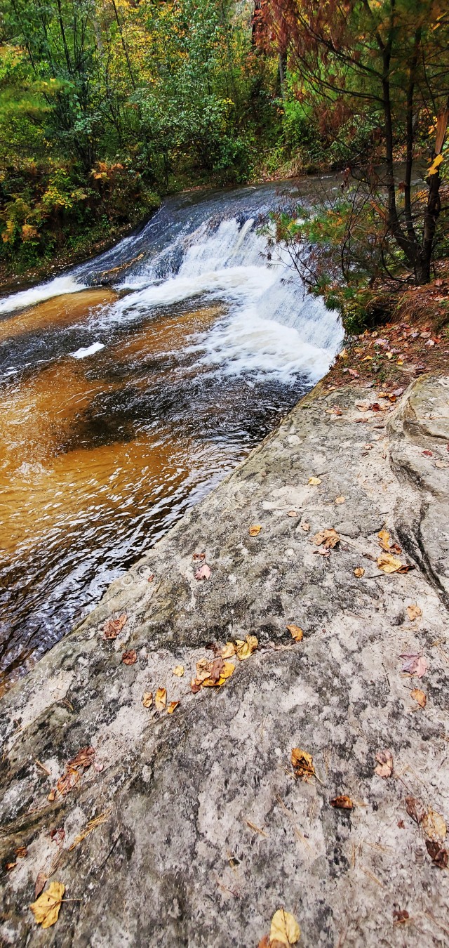 A scene of Trout Falls on the La Crosse River in the Pine View Recreation Area is shown with fall colors Sept. 27, 2020, at Fort McCoy, Wis. The recreation area includes acres of publicly accessible land with hiking trails, Pine View Campground,...