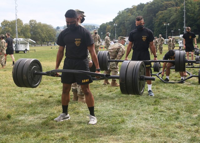 Class of 2022 Cadets Mulangaliro Rugema (front) and Gerardo Marengo, both of Company I-4, perform the three-repetition deadlift, which is the first of the six-event Army Combat Fitness Test, Saturday at Target Hill Athletic Field.