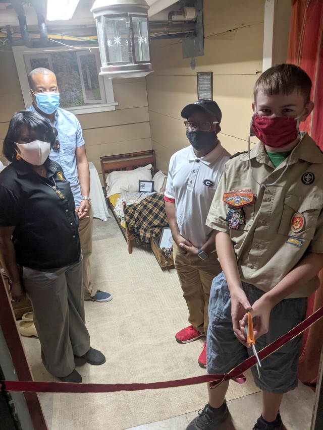 Nathan Lampman, a Scout with Fort Drum’s Troop 26 B, teamed up with the Cultural Resources staff on post to convert an old storage room into an authentic 19th century servants’ quarters for his Eagle Scout project. A ribbon-cutting ceremony...