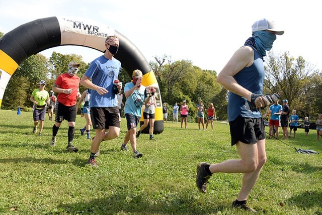 Participants in the 1908 Ultra Challenge trail run take off from the starting point Sept. 26 at Camp Conestoga. The event was 19 hours and eight minutes long -- 1908 was the year the U.S. Army Reserve was federally recognized. Photo by Prudence Siebert/Fort Leavenworth Lamp