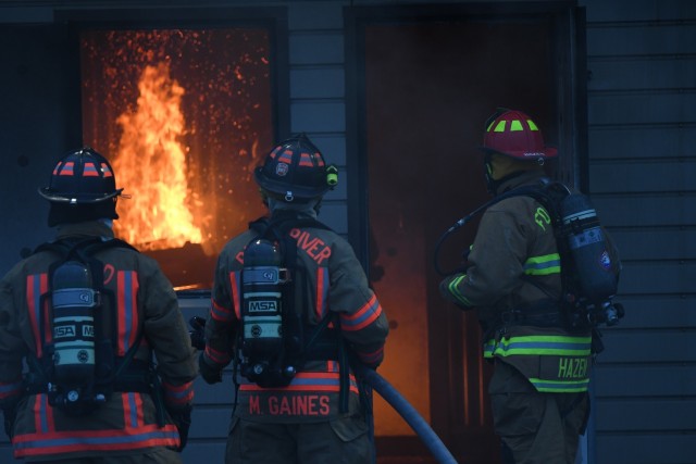 Firefighters from Fort Drum Fire and Emergency Services Division and Black River Volunteer Fire Department team up for a mutual aid nighttime live fire training event Sept. 29 at the Fort Drum Fire Department Training Center at Wheeler-Sack Army...