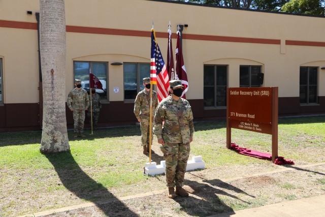Lt. Col. Marie F. Slack, Soldier Recovery Unit commander, stands at attention during the re-designation ceremony, Oct. 1.