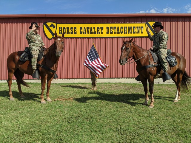 Staff Sgt. Randall Peaslee, career counselor, 1st Cavarly Division, re-enlists during a ceremony July 30 at the Horse Cavalry Detachment on Fort Hood. Headquarters, Department of the Army announced Oct. 5 that the 1st Cavalry Division placed...