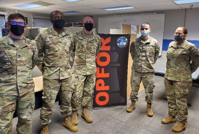 Soldiers from the Maryland National Guard’s 169 Cyber Protection Team stand with Col. Kristine Henry, commander of Task Force 291, at the conclusion of their participation in Cyber Shield 2020 at the Pvt. Henry Costin Readiness Center in Laurel,...