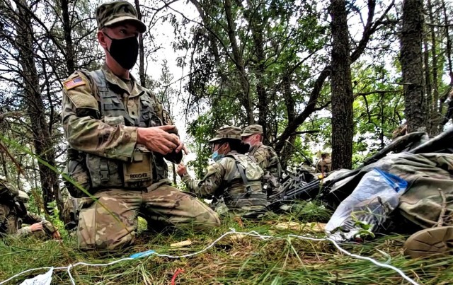 ROTC Cadet Mason Boucher with the University of Wisconsin-Stevens Point ROTC program and other cadets participate in field training Aug. 13, 2020, at Fort McCoy, Wis. Dozens of ROTC cadets from seven universities trained at Fort McCoy for 10 days...