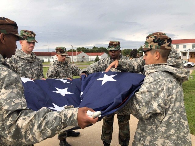 Wisconsin Challenge Academy cadets participate in a flag-raising effort Sept. 7, 2020, at the garrison flagpole at Fort McCoy, Wis. The Challenge Academy, a Fort McCoy tenant organization, offers youth the opportunity to change the direction of...