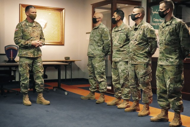 U.S. Army Col. Joseph Ewers (far left), the 81st colonel of the regiment, 2d Cavalry Regiment, shares positive remarks with regiment career counselors, assigned to 2CR, who received the USAREUR Commanding General’s Retention Excellence Award at the Reed Museum in Vilseck, Germany, Oct. 5, 2020. The regimen exceeded all assigned retention objectives, reenlisting over 1,400 Soldiers and paid out $3.5 million in selective reenlistment bonuses, the highest amount in USAREUR. (U.S. Army photo by Sgt. LaShic Patterson)
