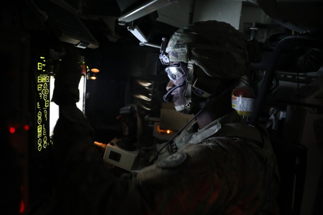 U.S. Army Spc. Javon Holmes of 1st Squadron, 2d Cavalry Regiment participates in a night live fire as a part of his qualification on the 30mm Stryker Infantry Carrier Vehicle - Dragoon on Rose Barracks, Germany, August 13, 2020. Spc. Holmes qualified with a superior rating, scoring an 850 out of 1000 on the Stryker qualification. (U.S. Army photo by Maj. John Ambelang, 2d Cavalry Regiment)