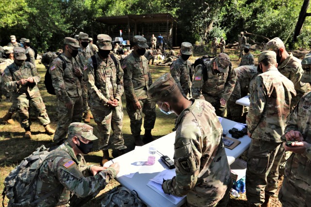 More than 60 Active and Reserve component Soldiers assigned to Headquarters and Headquarter Company, 311th Signal Command (Theater) conducted a land navigation refresher-training course at the Army’s East Range on Oahu, Oct. 3-4, 2020. The daylong event, which began at 8 a.m., was part of an annual training requirement for active duty soldiers and a bi-annual training requirement for Army Reserve Soldiers. The training requirement was mandatory for enlisted ranks of grades E-7 and below and officers of grades O-2 and below. (Official U.S. Army photo by Marc Ayalin)