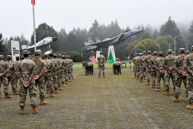 U.S. Air Force Lt. Col. Ricardo L.A. Camel assumes command of the 225th Support Squadron during an outdoor ceremony in front of the Western Air Defense Sector, Joint Base Lewis-McChord, Washington, Oct. 3, 2020.