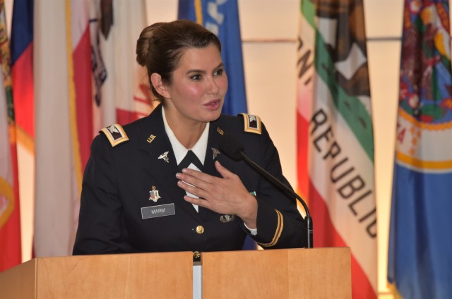 Col. Lynn Marm offers remarks during a retirement ceremony for Linda Foltz, one of the longest-tenured civilian employees of the U.S. Army Medical Materiel Agency, on Sept. 30 at Fort Detrick, Maryland. Marm served as commander of USAMMA from 2016 to 2018.