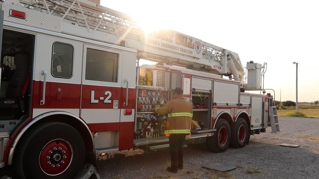 Fort Sill firefighters set up at the Brian K. Langford Training Tower Oct. 2, 2020, to perform annual vertical structure fire certification. They also assisted the Fort Sill Garrison and Directorate of Emergency Services command teams in going through the structure safely.