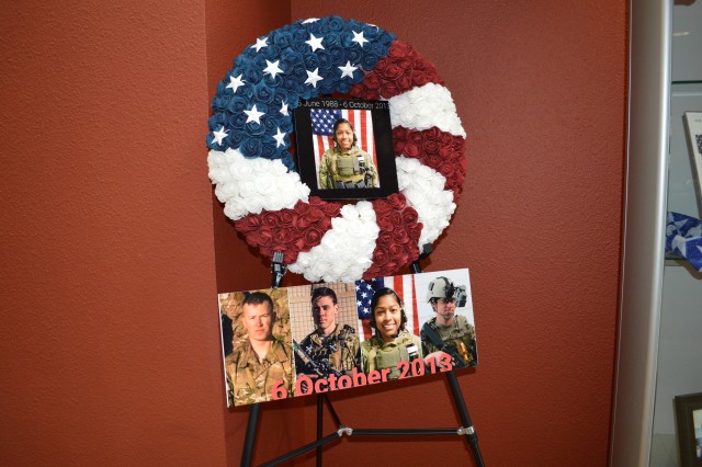 Navy Chief Hospital Corpsman (FMF/EXW/IW) Donald Browning, a medical officer program recruiter, placed a wreath display at the Moreno Clinic on Joint Base San Antonio Fort Sam Houston from Oct. 5 to Oct. 9 to commemorate the passing of Capt. Jennifer Moreno, for whom the clinic is named. Moreno, who was an Army Nurse Corps Officer, was killed in action on Oct. 6, 2013 in Afghanistan as she was going through an area with improvised explosive devices to render medical aid to casualties.  
“Although I never worked with Capt. Moreno or her team, I was blessed to be part of the amazing team that received the notification of the attack, the inbound casualties, receiving of the casualties, and ensuring no weapons or explosives were on the team members coming into the hospital,” Browning said. “I was also witness to the care given to them as they moved through the emergency department, surgeries, nursing services and medevac’d to Germany/ home.”
He felt it was fitting to place the wreath on the day she lost her life to remember her sacrifice for the Soldiers she helped bring home.
“Capt. Jennifer Moreno is a true hero. An example of what courage under fire, brotherly/sisterly love, and compassion for humankind.” (U.S. Army photo by Daniel J. Calderón)