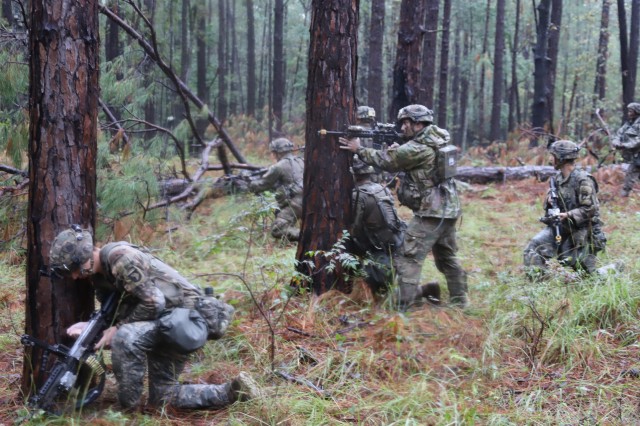 Bulldogs assigned to 1st Battalion, 327th Infantry Regiment, 1st Brigade Combat Team, 101st Airborne Division (Air Assault), attack the enemy threat, Sept. 23, during offensive operations at Joint Readiness Training Center-Fort Polk, Louisiana. Bastogne conducted a month long training exercise at JRTC to maintain their readiness and prepare for future operations. (U.S. Army photo by Staff Sgt. Justin Moeller, 40th Public Affairs Detachment)