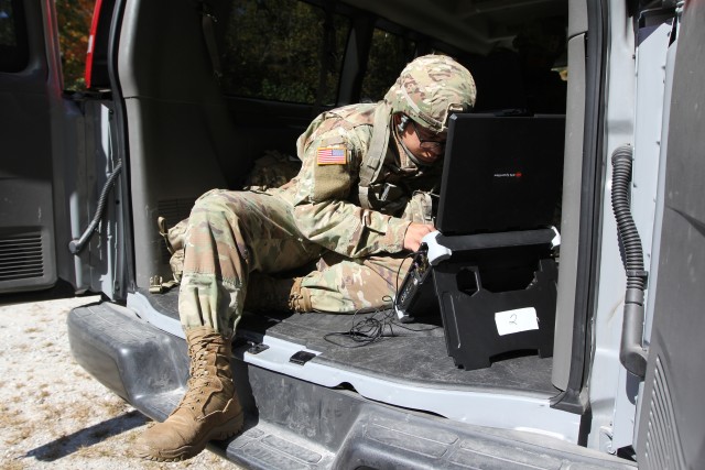 BUTLERVILLE, Ind. – Spc. Matthew Scruggs, who hails from Fort Benning, Georgia, is a cyberspace operations specialist assigned to Expeditionary CEMA (cyberspace electromagnetic activities) Team, ECT-01, 915th Cyber Warfare Battalion,...