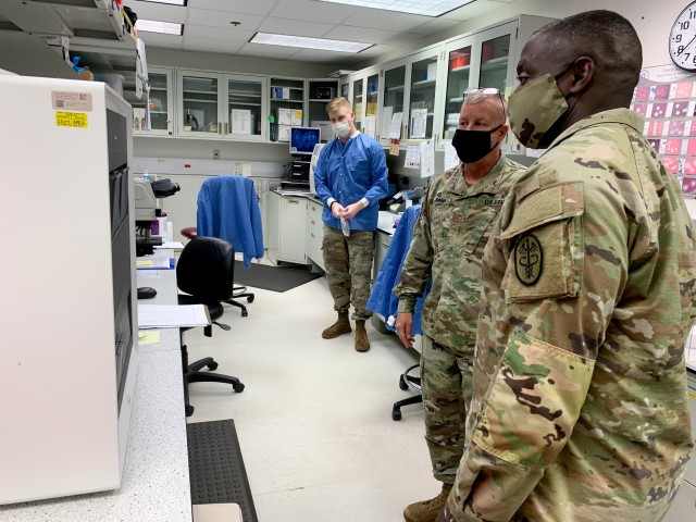 Maj. John Paap, Lab Manager at Winn Army Community Hospital discusses COVID-19 capabilities with MEDCOM Commander, Lt. Gen. R. Scott Dingle during The Surgeon General of the Army visit to Fort Stewart, Sept. 28-29.