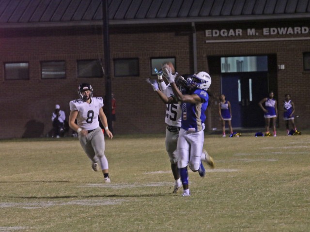 The 3rd Infantry Division band, led by Chief Warrant Officer 3 Mike Krzmarzick, perform a half-time show during a military appreciation game between Bradwell Institute and Richmond Hill High School Oct. 9, 2020, at Olvey Field, Hinesville,...