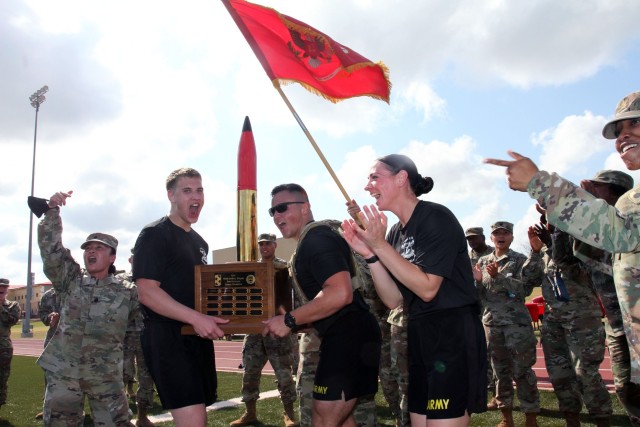 Members of 1st Battalion, 40th FA, hold the trophy after winning the Iron Destroyer Games Oct. 9, 2020, at Hellcat Field on Fort Sill, Oklahoma. It was the third straight time that 1-40th FA won the championship.
