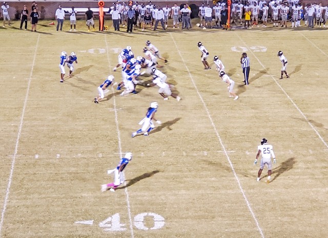 Bradwell Institute execute an offensive play during a military appreciation game between Bradwell Institute and Richmond Hill High School Oct. 9, 2020, at Olvey Field, Hinesville, Georgia. State-ranked Richmond Hill defeated Bradwell Institute,...