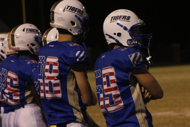 Bradwell Institute football players wear patriotic jerseys with the 3rd Infantry Division patch during a military appreciation game between Bradwell Institute and Richmond Hill High School Oct. 9, 2020, at Olvey Field, Hinesville, Georgia. Rocky,...