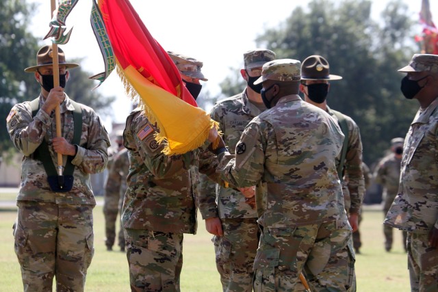 Command Sgt. Maj. Jon-Paul Zappala, left, receives the 428th Field Artillery Brigade colors from Col. Cornelius Morgan, brigade commander, to become the brigade CSM Oct. 8, 2020, on the Old Post Quadrangle. Departing Command Sgt. Maj. Gerry German...