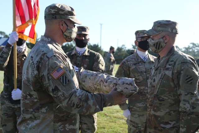 Col. Trent Upton, commander, and Command Sgt. Major Jonathan Reffeor, senior enlisted leader, 1st Armored Brigade Combat Team, case the colors of the 1st ABCT during the unit’s color casing ceremony at Cottrell Field in Fort Stewart, Georgia, Oct. 1, 2020. The 1st ABCT will replace the 2nd Brigade Combat Team, 1st Infantry Division, as part of a regular rotation of forces to support the United States’ commitment to Southeast Asia partners and allies. The Raider Brigade has a storied history including four deployments to Iraq and most recently a rotation to Korea in 2018 as the Regionally Aligned Force to the U.S. Pacific Command. This will be their sixth rotation to the Republic of Korea. (U.S. Army photo by Sgt. Reva Catholic)