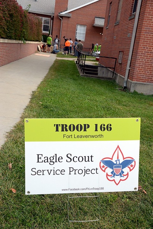 Volunteers build a blessing box for Scouts BSA Troop 166 member Carey Nestler's Eagle Scout project Oct. 10 outside Pioneer Chapel. Carey measured and cut the boards on Friday, and her volunteer team built and stained the box on Saturday. The...