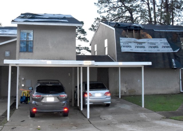 Roofs damaged by Hurricane Laura are battered by Hurricane Delta at Fort Polk on Oct. 9.