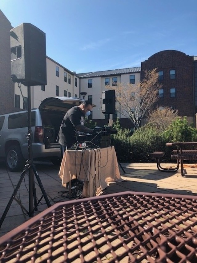 Adaptive Reconditioning Support Specialist David Iuli plays music during a Rock the Quad music experience at the Joint Base Lewis-McChord Soldier Recovery Unit. The event was held at the barracks for Soldiers following COVID-19 pandemic...