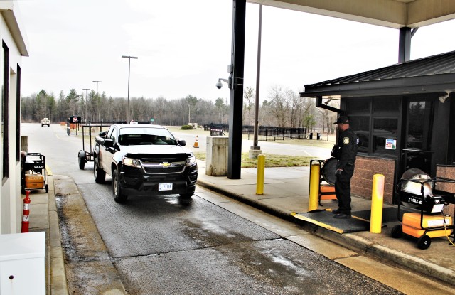 A vehicle approaches the Main Gate on April 3, 2020, at Fort McCoy, Wis. In late 2020, Fort McCoy began using the Army's Automated Installation Entry System for people entering the installation. (U.S. Army Photo by Scott T. Sturkol, Public Affairs...