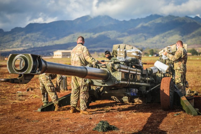 SCHOFIELD BARRACKS, Hawaii - Soldiers with Charlie Battery, 3rd Battalion, 7th Field Artillery Regiment, 3rd Brigade Combat Team, 25th Infantry Division prepare the M777 Howitzer for a sling load operation in preparation for a capabilities...