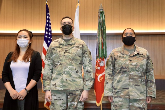 KADENA AIR FORCE BASE, Japan – From left to right, Hyun Ji Park, command sergeant major’s spouse of more than 17 years; Command Sgt. Maj. Daniel S. Venton, 1st Battalion, 1st Air Defense Artillery Regiment senior enlisted advisor; and Lt. Col. Rosanna M. Clemente, present Venton’s lateral appointment to command sergeant major during an assumption of responsibility ceremony at the Rocker Enlisted Club here Oct. 20. Venton took over as the new command sergeant major of the Snake Eyes Battalion.